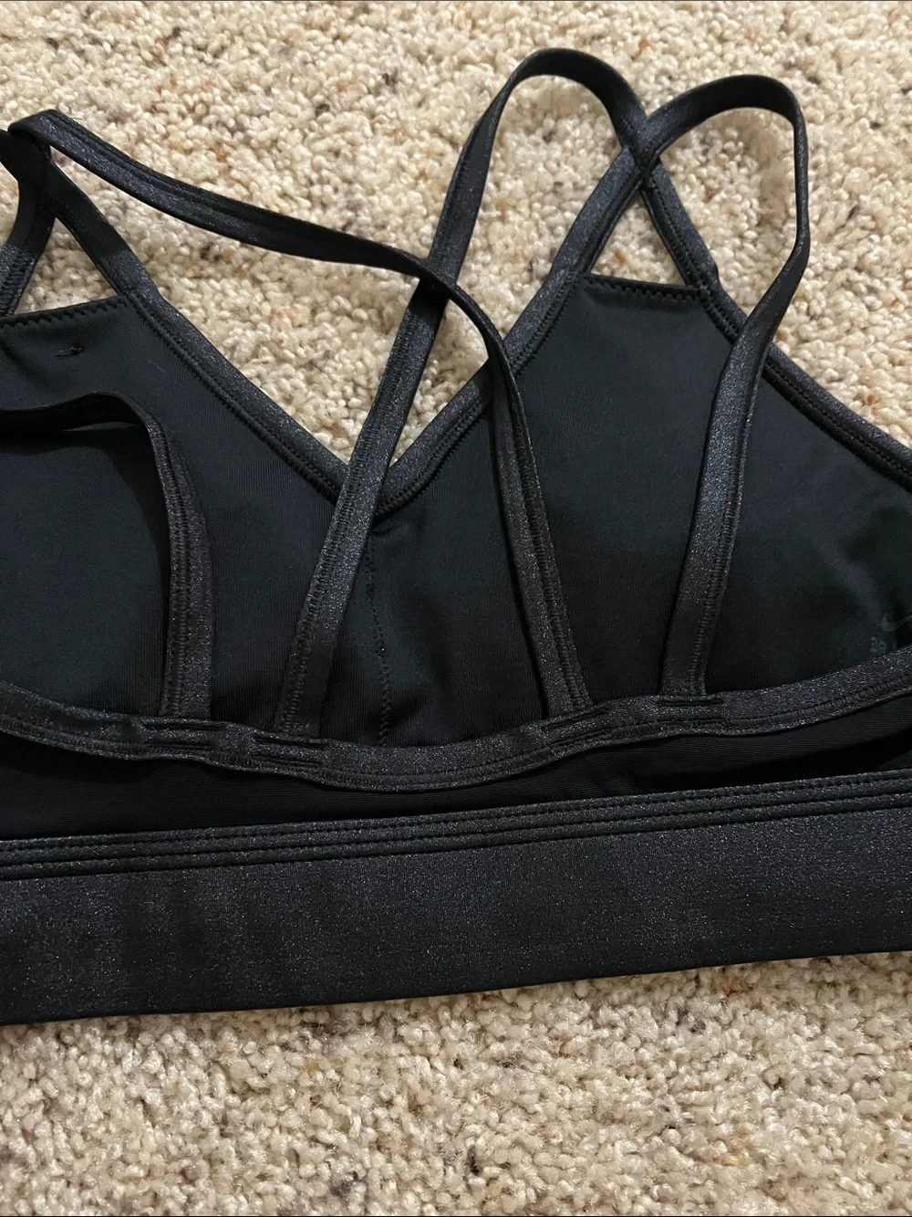 Nike Black Strappy V‑Neck Sports Bra with White Swoosh